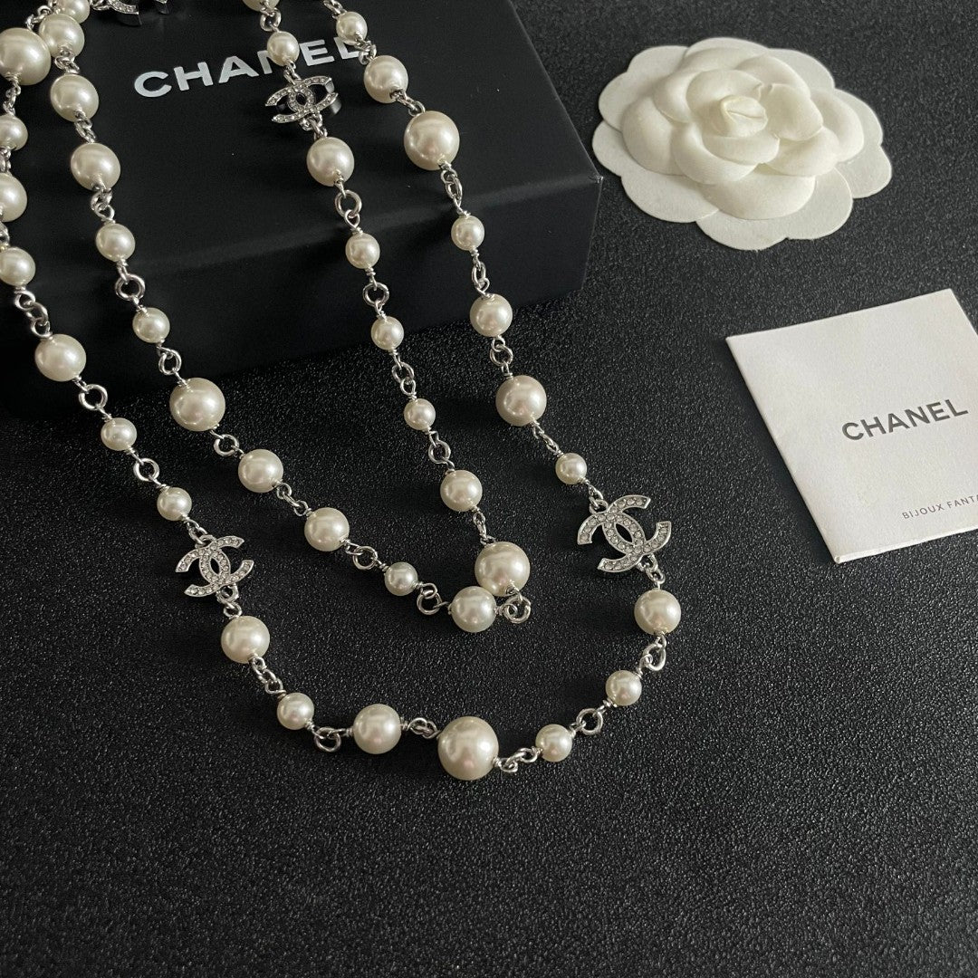 Double-C Emblem Pearl-Detail Pendant Necklace – Pearl Detail – Design 115 styled product view