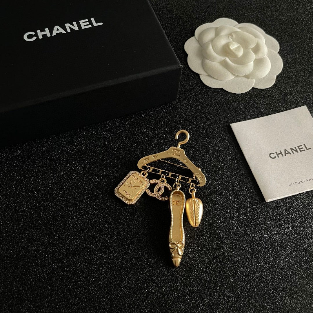Double-C Emblem Brooch in Polished Metal-Tone – Design 072 styled product view