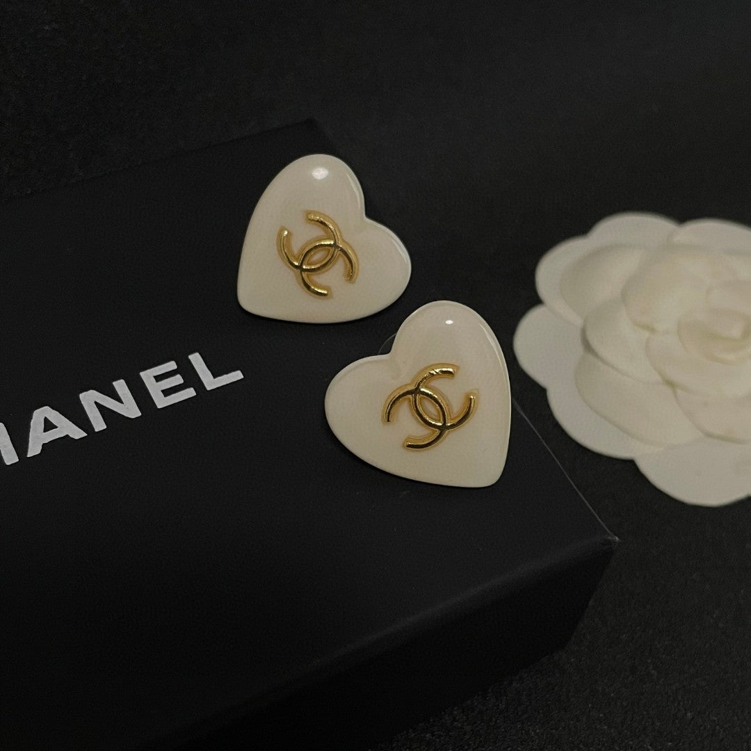 Double-C Emblem Stud Earrings in Polished Metal-Tone – Heart Detail – Design 015 detail view