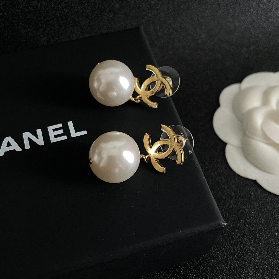 Double-C Emblem Pearl-Detail Stud Earrings – Pearl Detail – Design 024 detail view