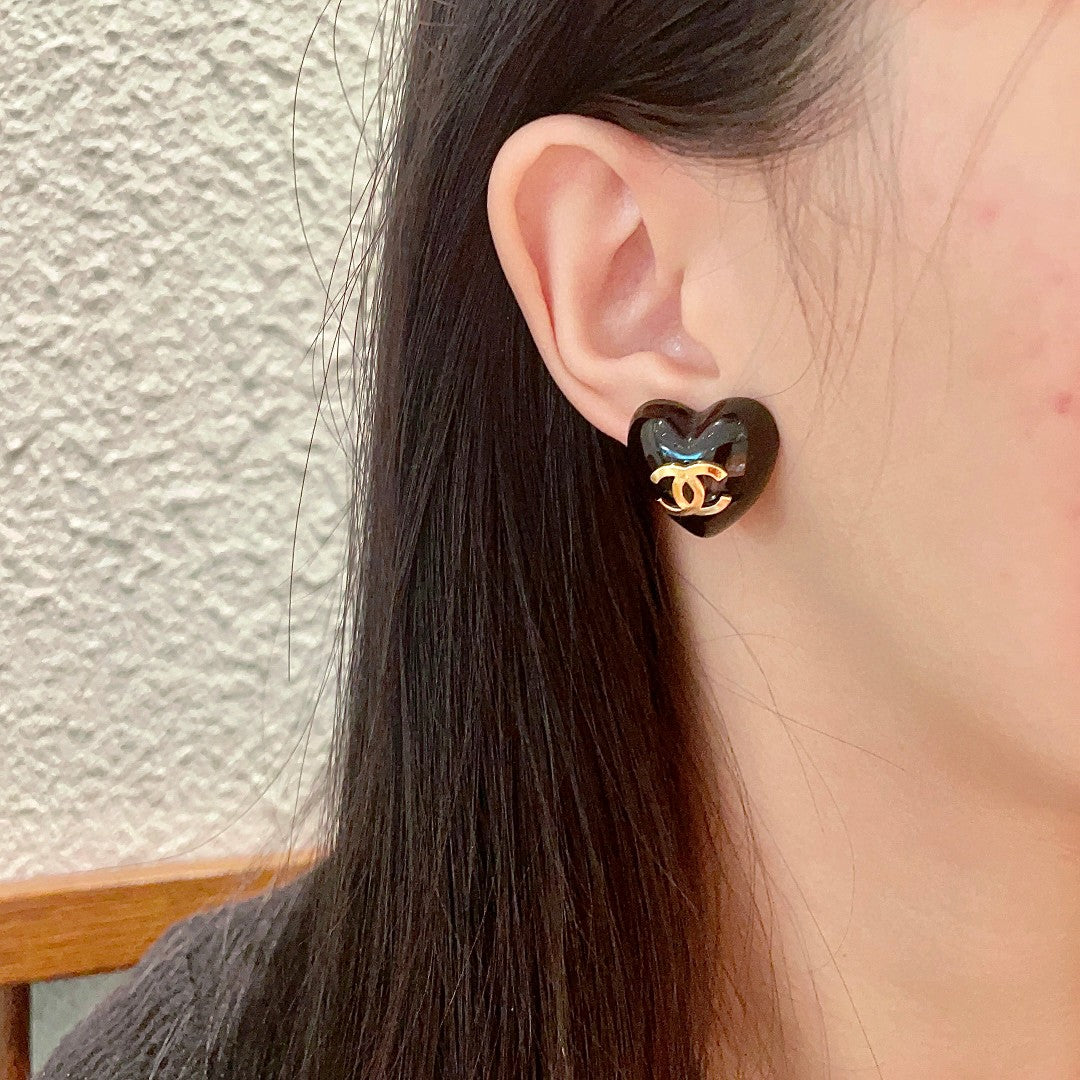 Double-C Emblem Stud Earrings in Polished Metal-Tone – Heart Detail – Design 014 detail view