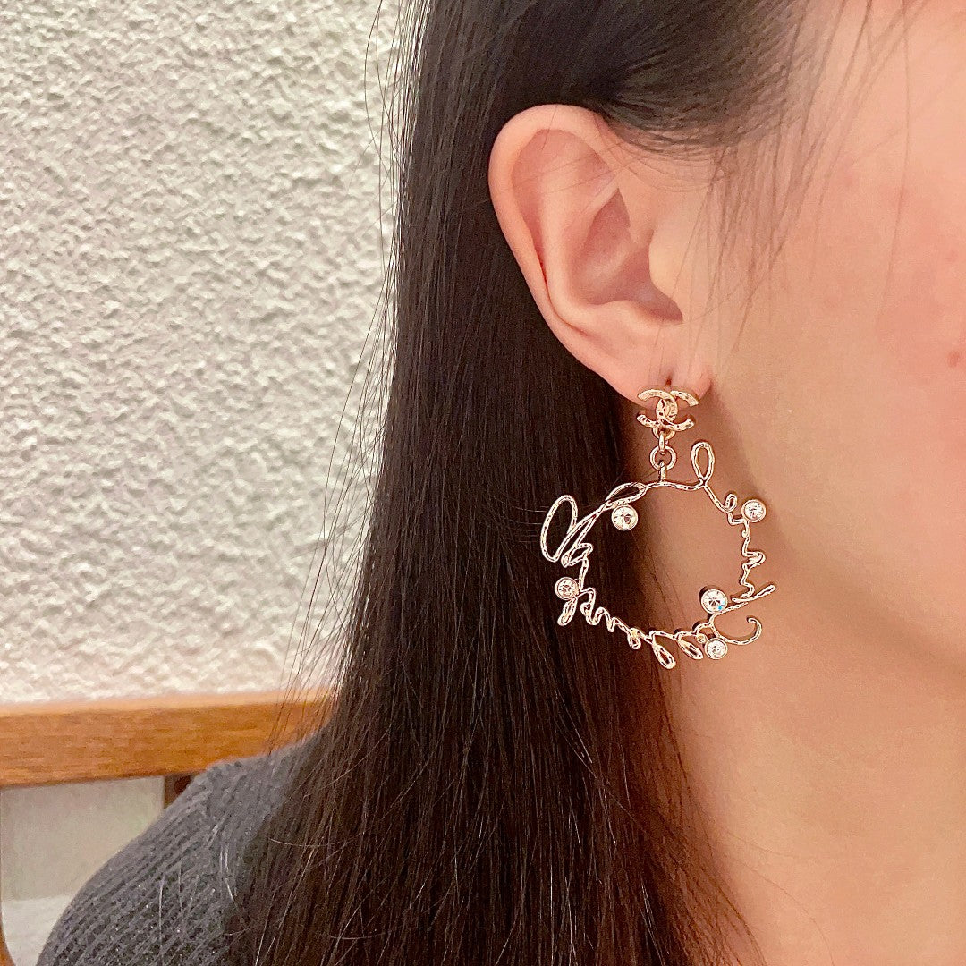 Double-C Emblem Statement Earrings in Polished Metal-Tone – Design 060 side detail