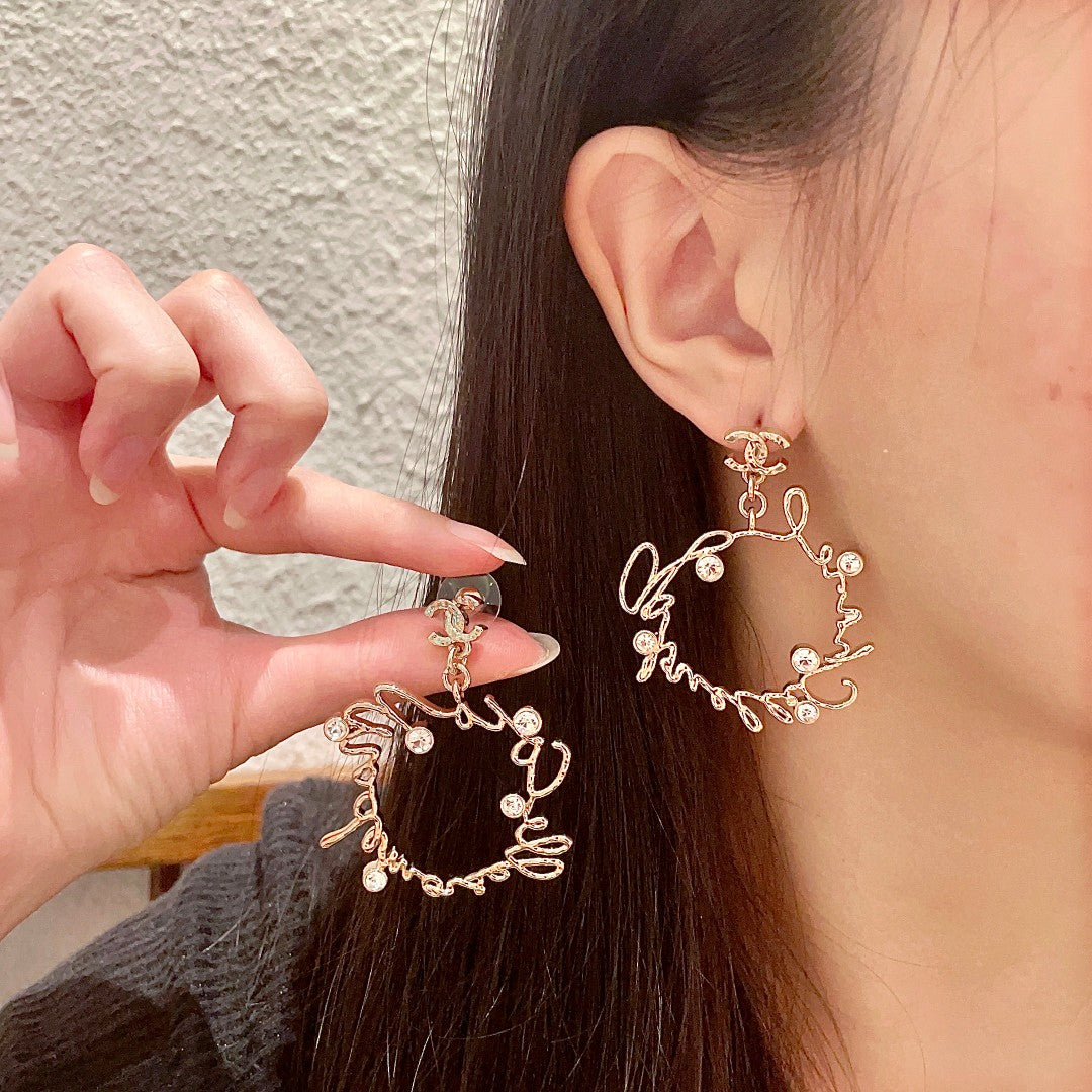 Double-C Emblem Statement Earrings in Polished Metal-Tone – Design 060 front product view