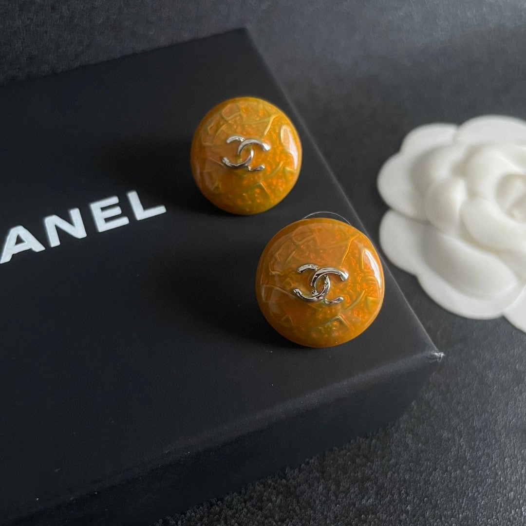 Double-C Emblem Stud Earrings in Polished Metal-Tone – Design 362 detail view