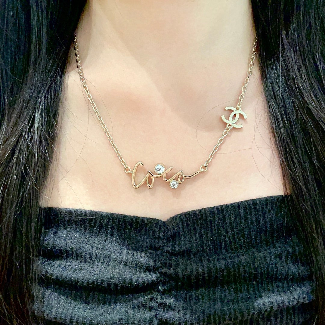Double-C Emblem Pendant Necklace in Polished Metal-Tone – Design 062 detail view