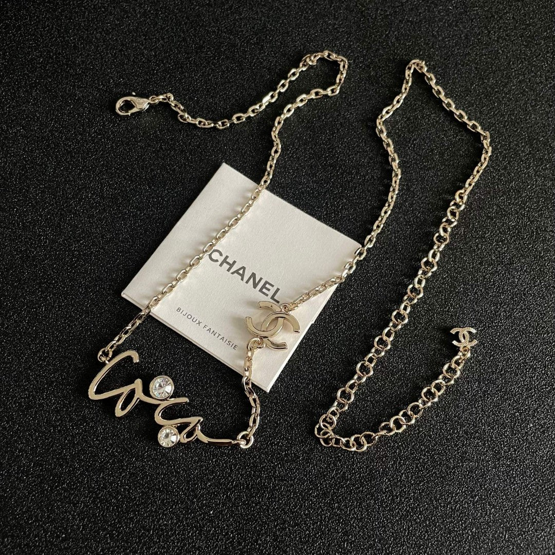 Double-C Emblem Pendant Necklace in Polished Metal-Tone – Design 062 detail view