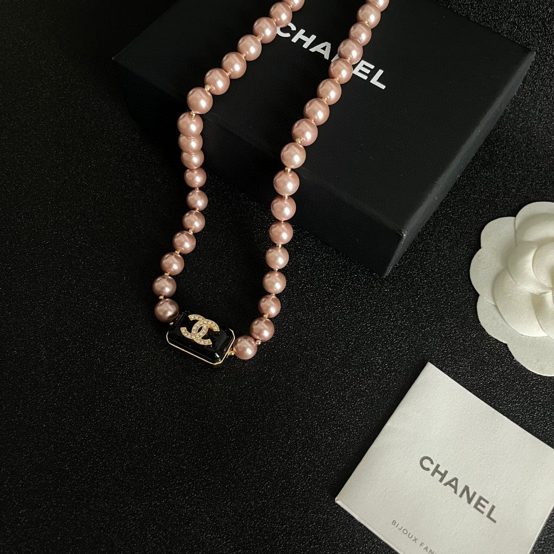 Double-C Emblem Pearl-Detail Pendant Necklace – Pearl Detail – Design 101 close-up detail