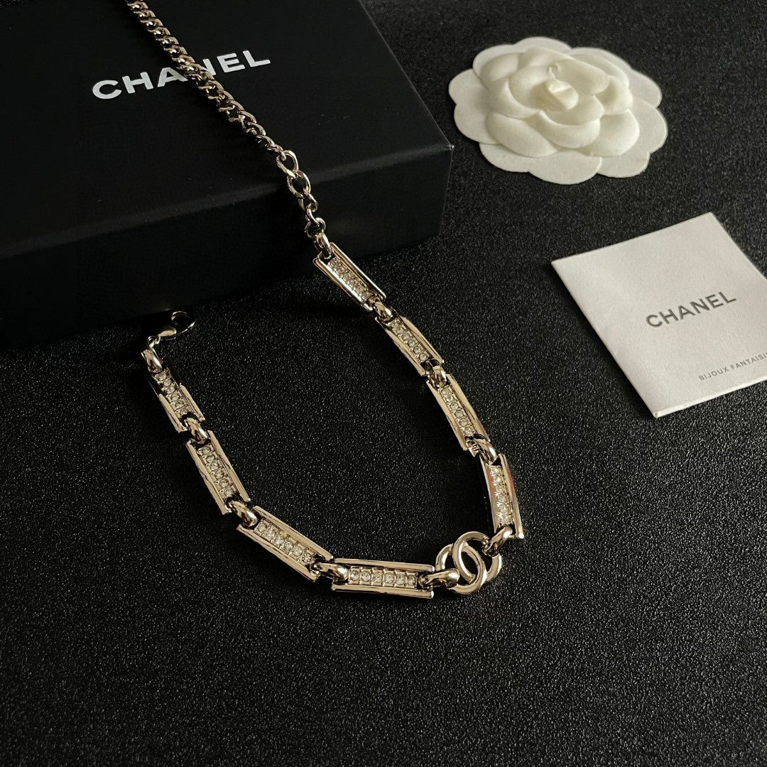 Double-C Emblem Pendant Necklace in Polished Metal-Tone – Design 059 close-up detail