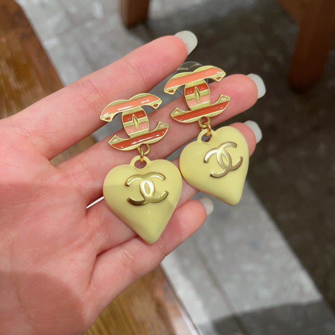 Double-C Emblem Statement Earrings in Polished Metal-Tone – Heart Detail – Design 004 side detail