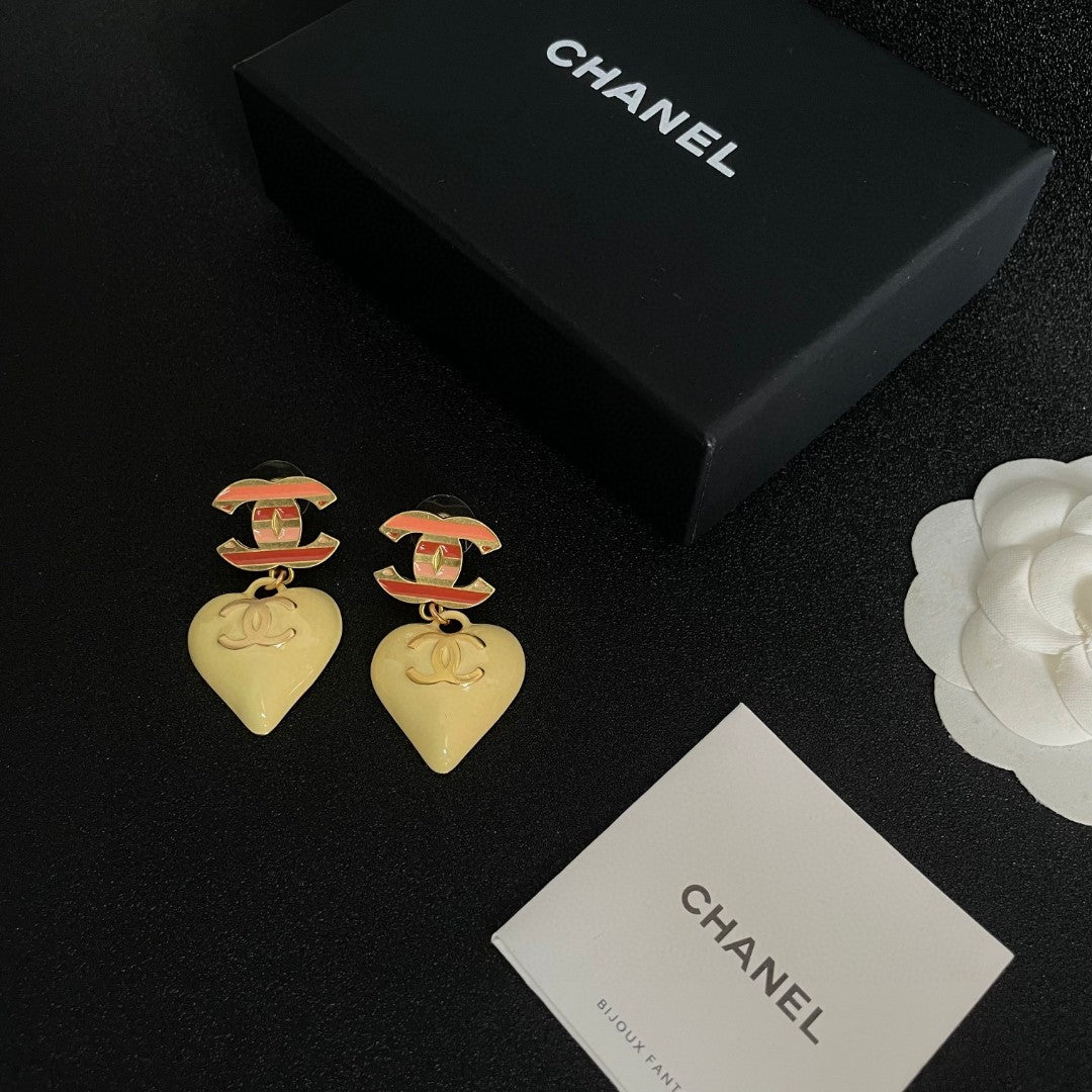 Double-C Emblem Statement Earrings in Polished Metal-Tone – Heart Detail – Design 004 close-up detail