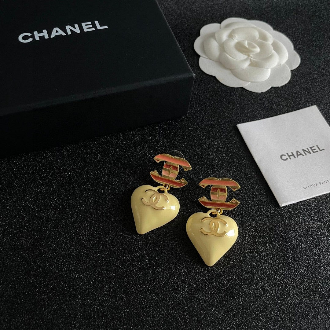 Double-C Emblem Statement Earrings in Polished Metal-Tone – Heart Detail – Design 004 styled product view