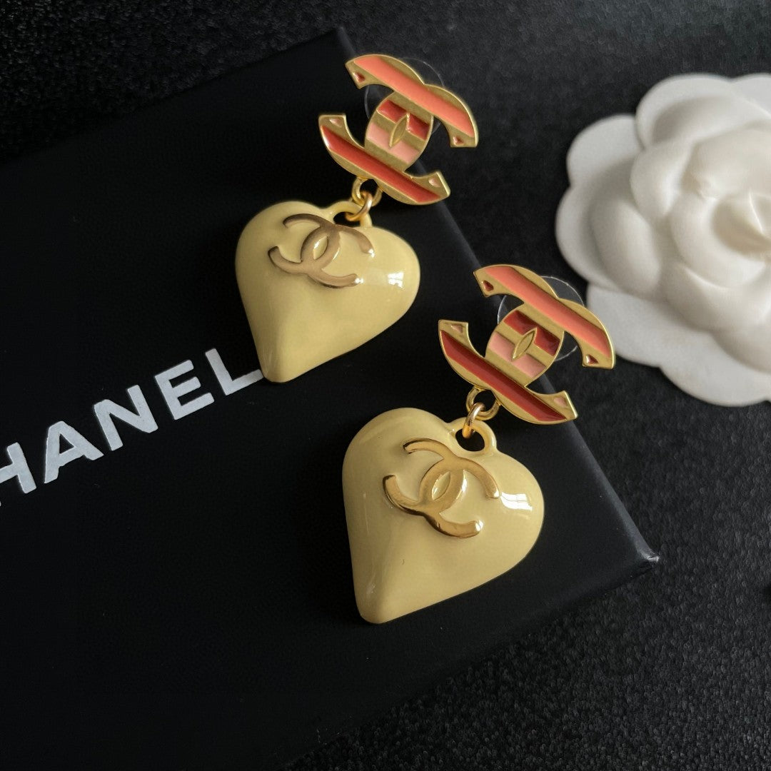 Double-C Emblem Statement Earrings in Polished Metal-Tone – Heart Detail – Design 004 detail view