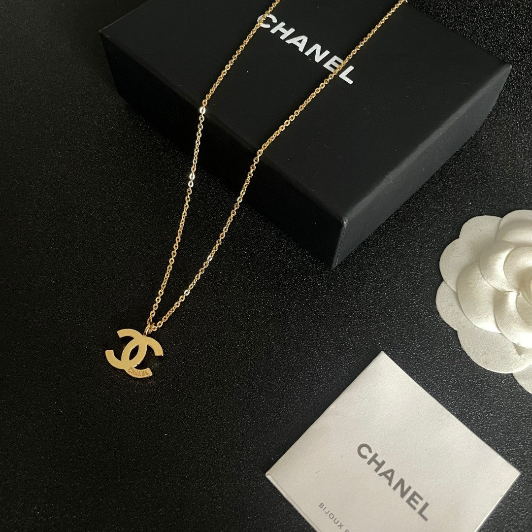 Double-C Emblem Pendant Necklace in Polished Metal-Tone – Design 058 close-up detail