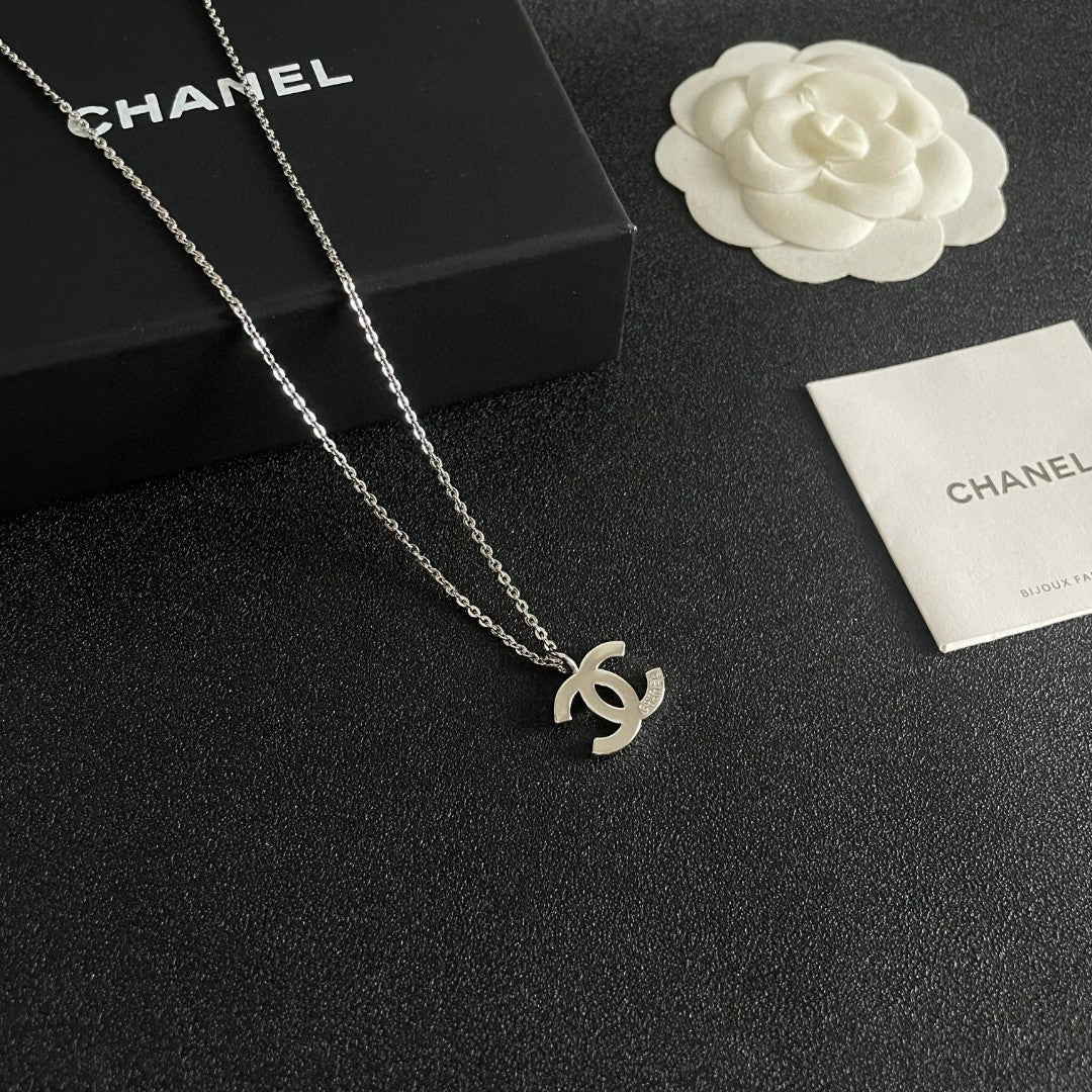 Double-C Emblem Pendant Necklace in Polished Metal-Tone – Design 057 styled product view