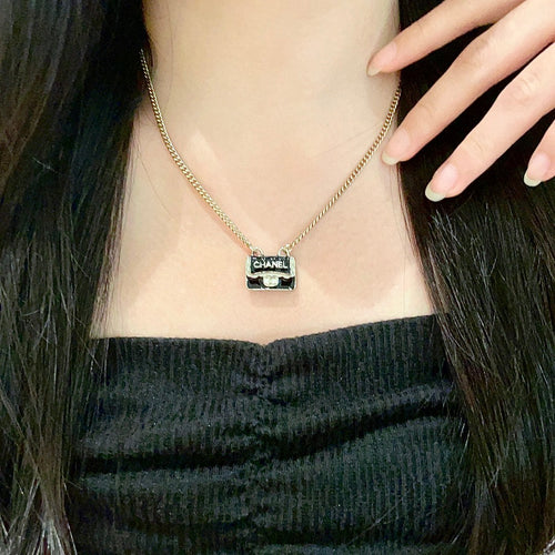 Double-C Emblem Pendant Necklace in Polished Metal-Tone – Design 056 main product view