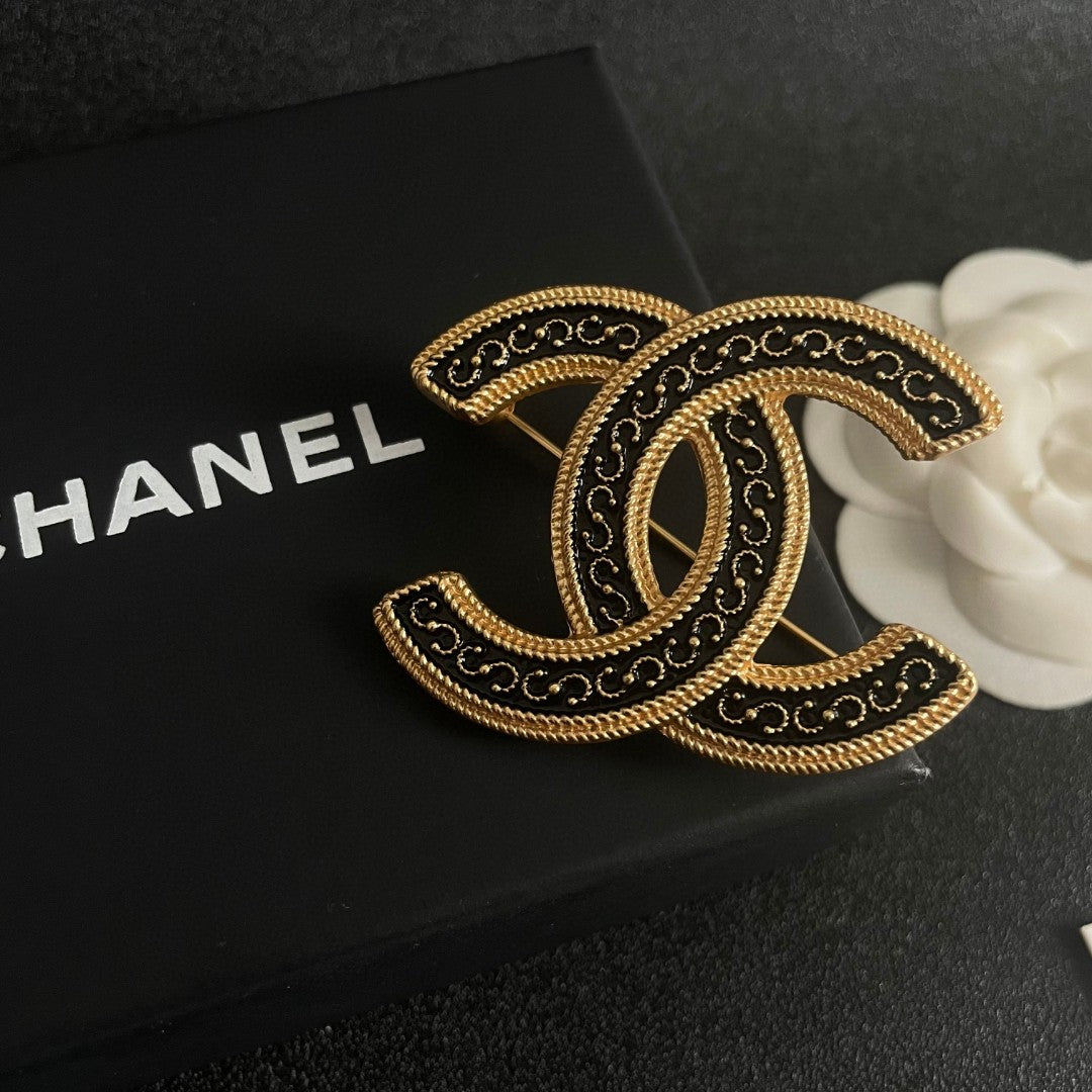 Double-C Emblem Brooch in Polished Metal-Tone – Design 068 detail view