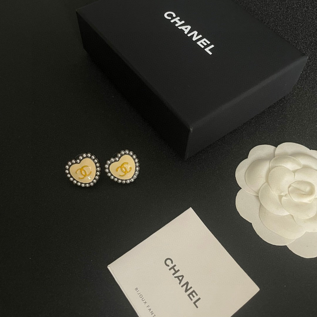 Double-C Emblem Pearl-Detail Stud Earrings – Pearl Detail – Design 019 close-up detail