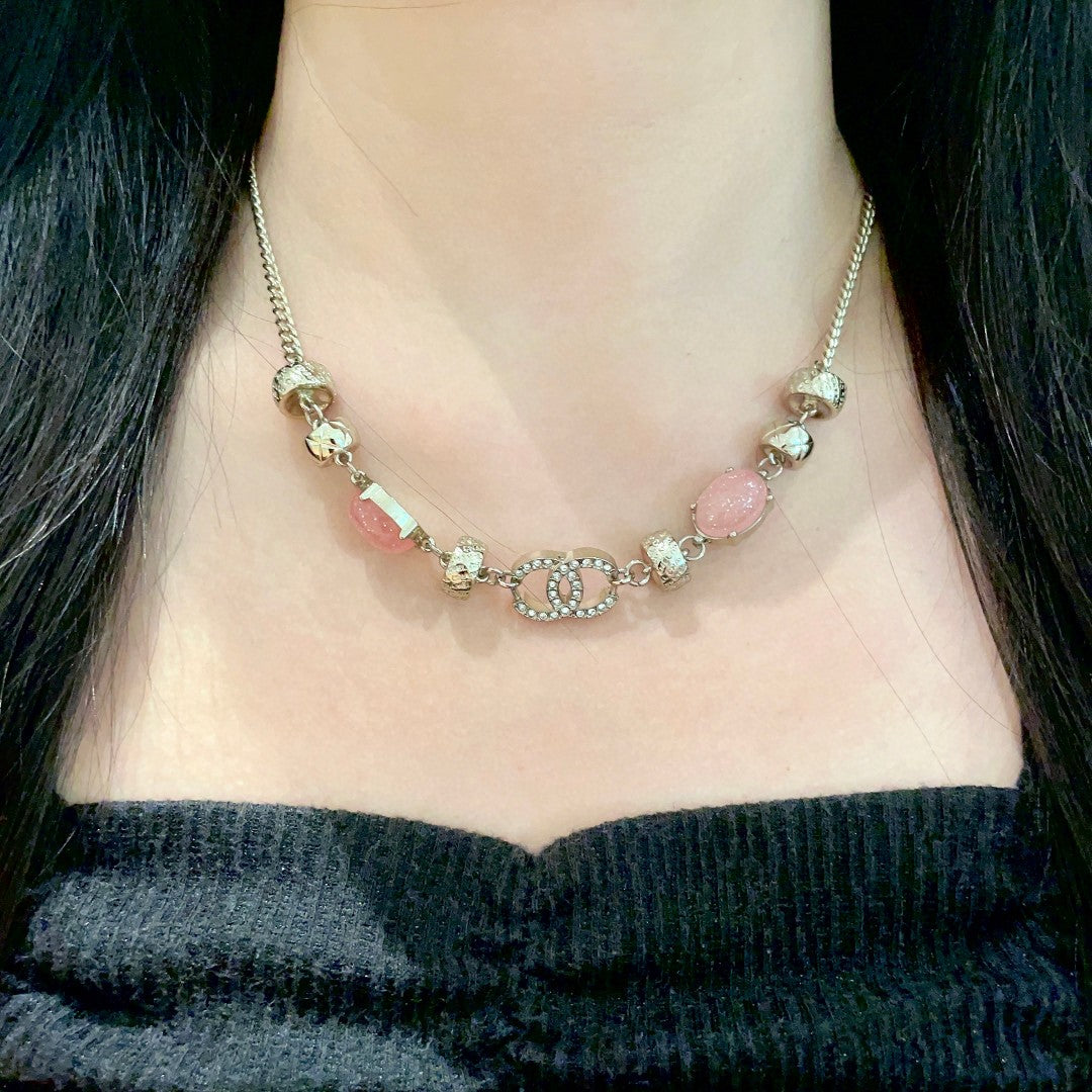 Double-C Emblem Pendant Necklace in Polished Metal-Tone – Pink Detail close-up detail