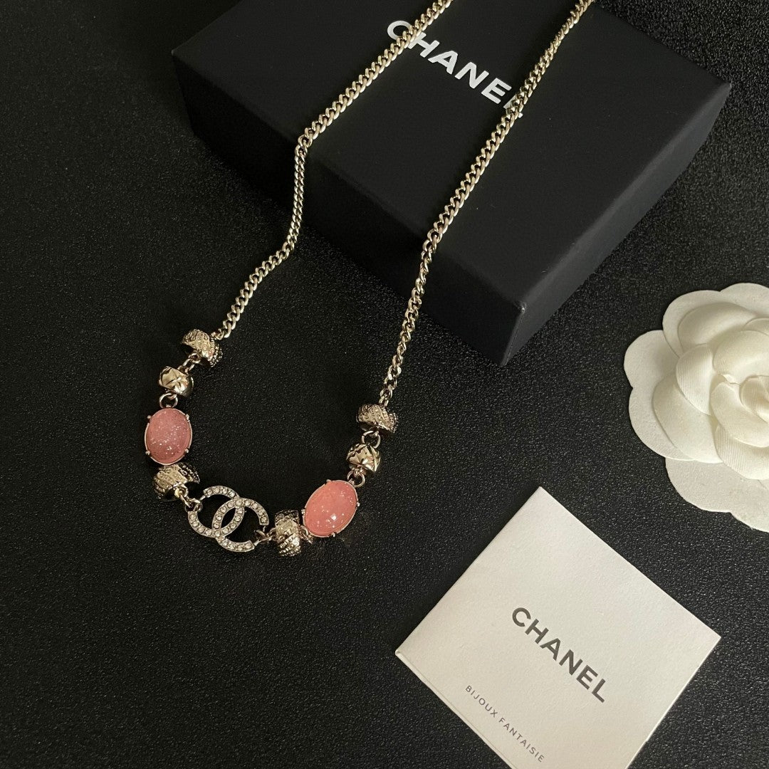 Double-C Emblem Pendant Necklace in Polished Metal-Tone – Pink Detail main product view