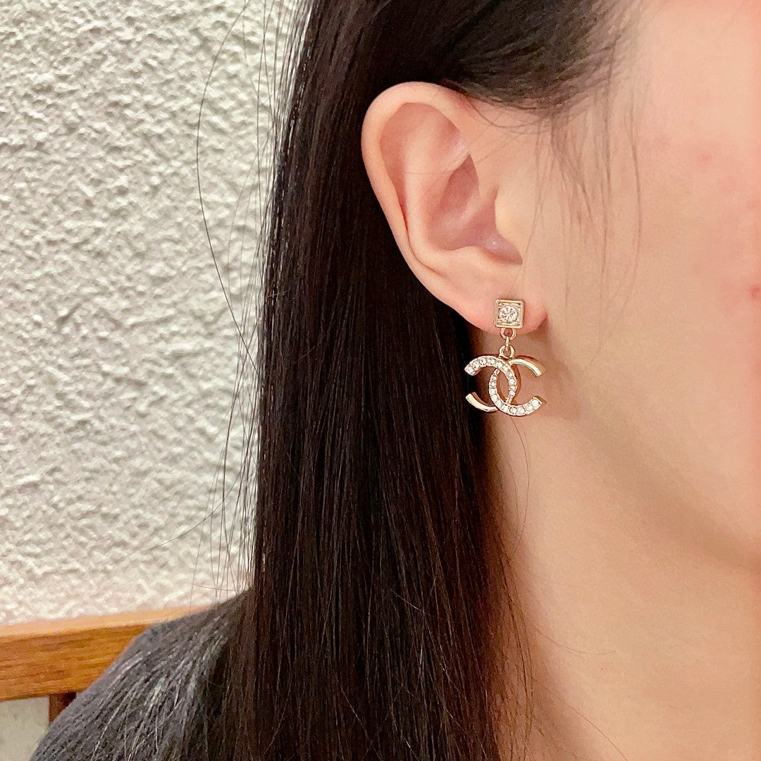 Double-C Emblem Crystal-Accent Statement Earrings – Design 023 detail view