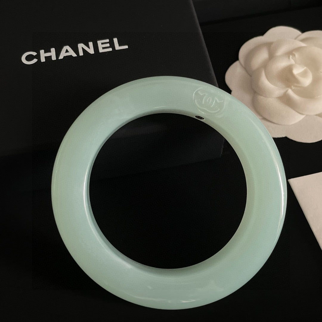 Signature Emblem Bangle in Polished Metal-Tone – Design 024 detail view