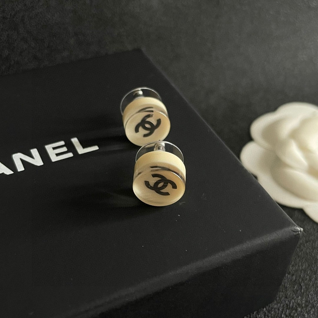 Double-C Emblem Stud Earrings in Polished Metal-Tone – Design 297 front product view