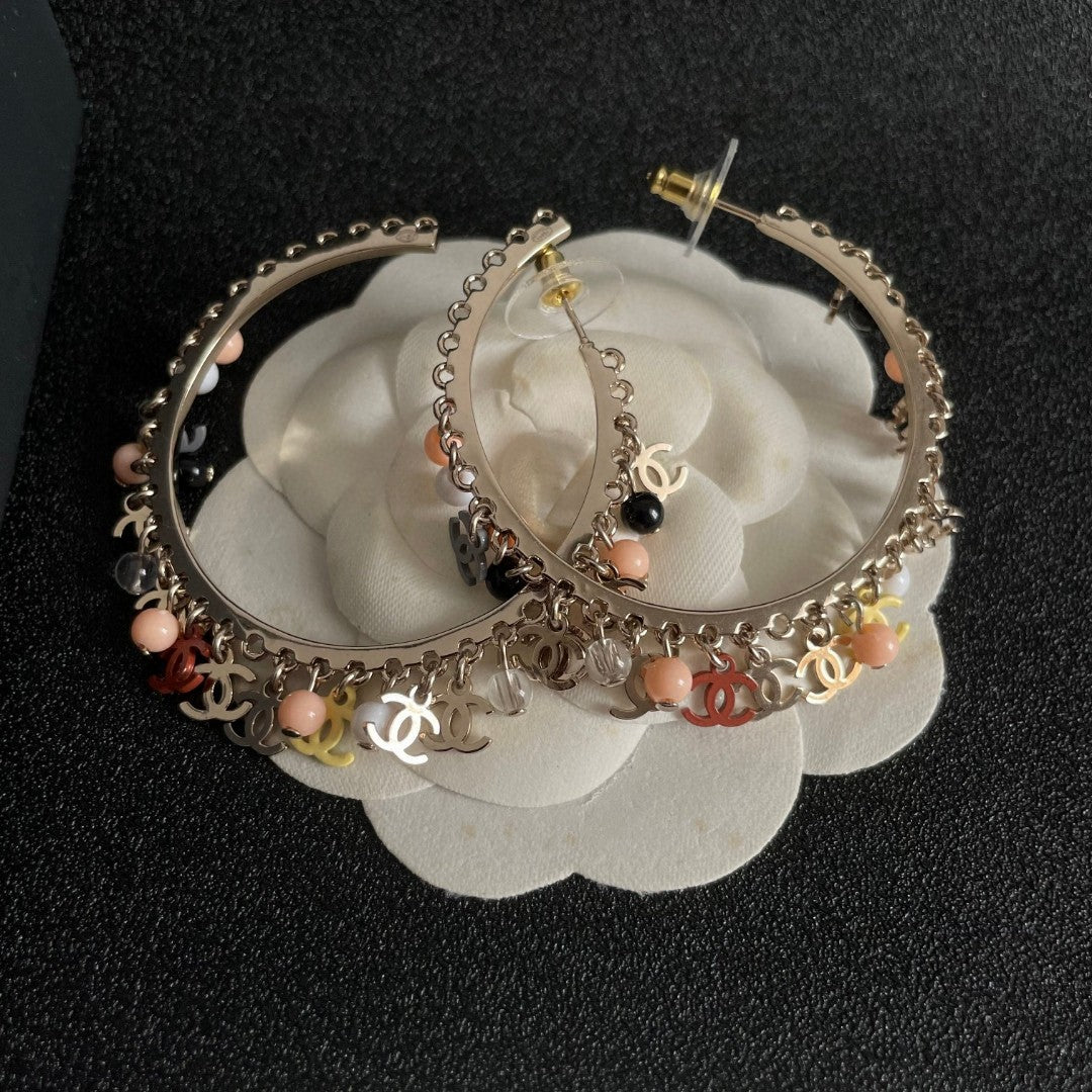 Double-C Emblem Pearl-Detail Statement Earrings – Pearl Detail – Design 020 front product view
