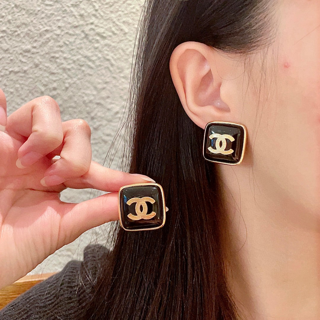 Double-C Emblem Stud Earrings in Polished Metal-Tone – Design 295 main product view