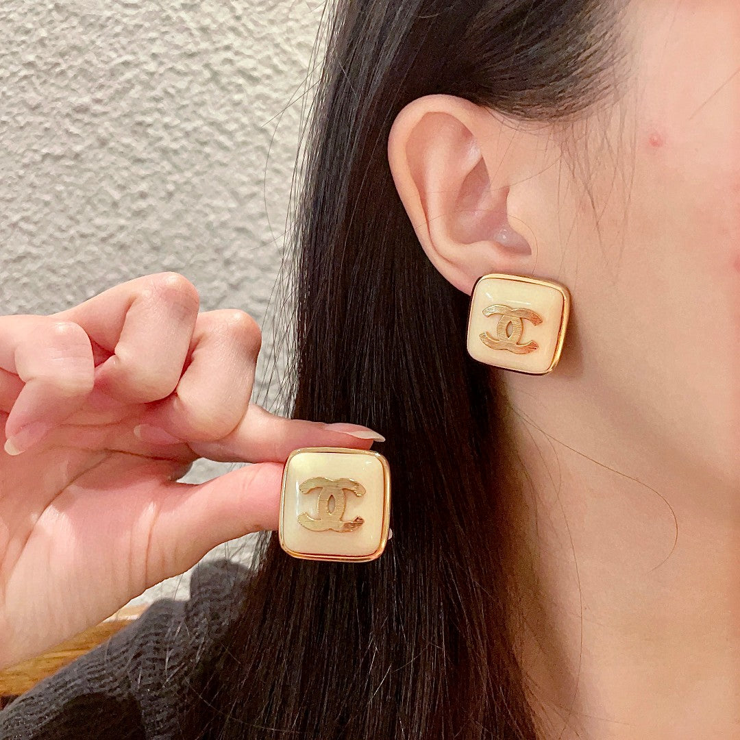 Double-C Emblem Stud Earrings in Polished Metal-Tone – Design 294 main product view