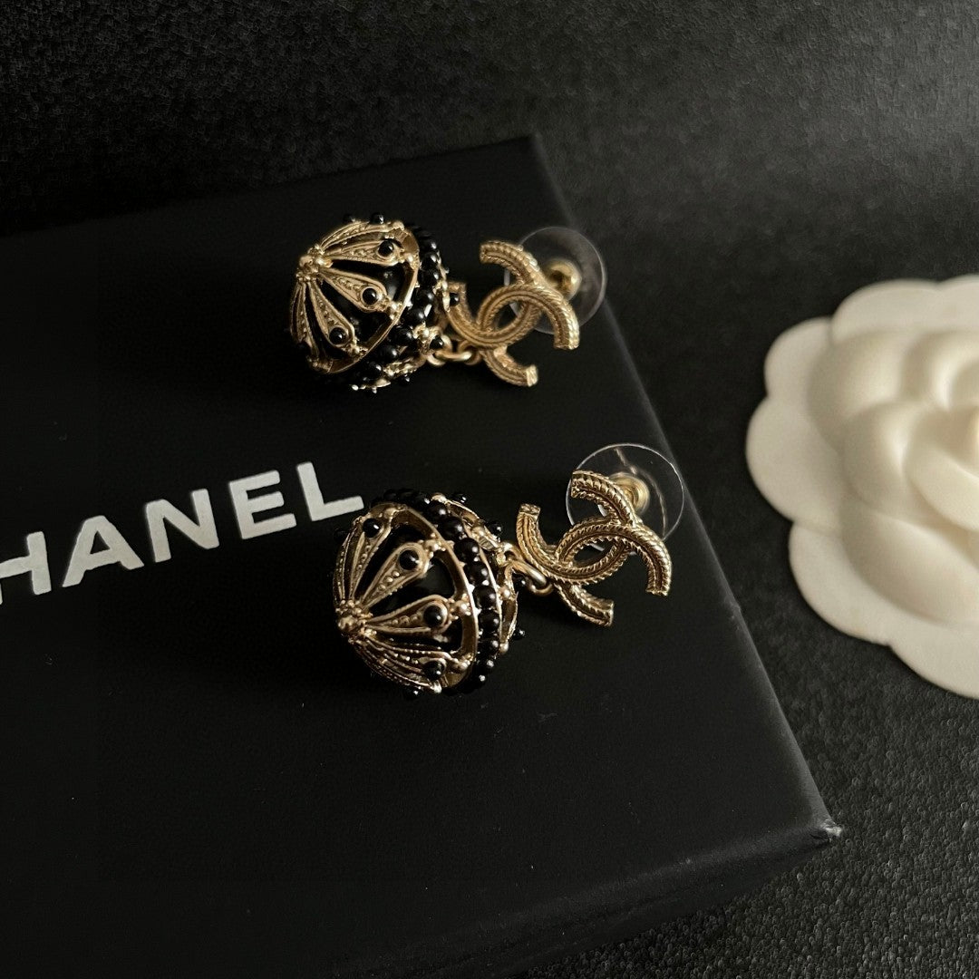 Double-C Emblem Pearl-Detail Stud Earrings – Pearl Detail – Design 013 detail view