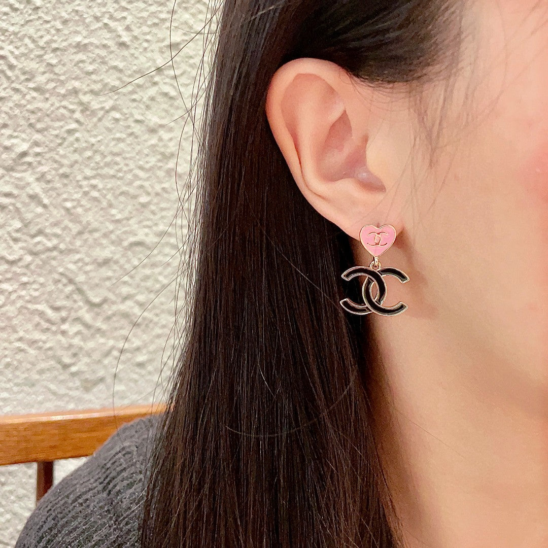 Double-C Emblem Statement Earrings in Polished Metal-Tone – Heart Detail detail view