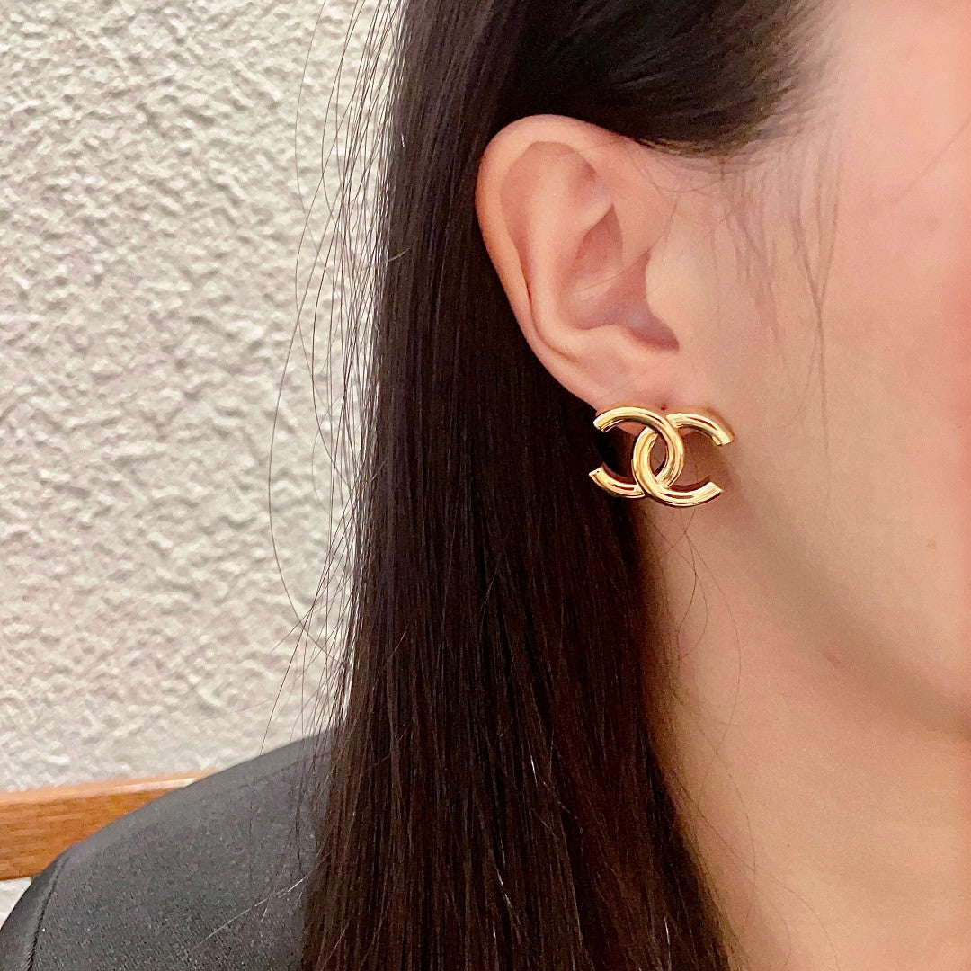 Double-C Emblem Stud Earrings in Polished Metal-Tone – Design 263 detail view