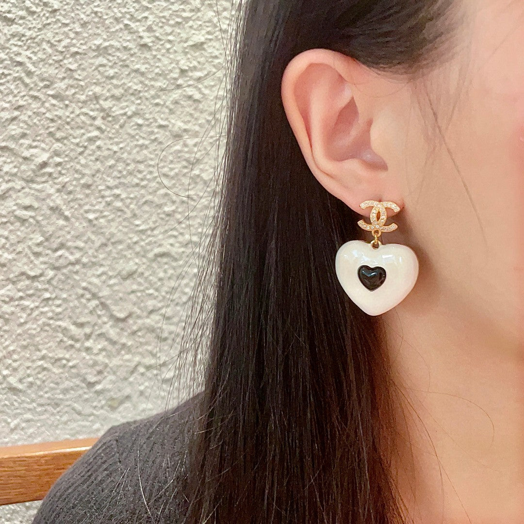 Double-C Emblem Crystal-Accent Statement Earrings – Heart Detail – Design 002 detail view