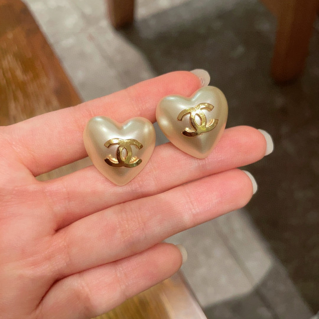 Double-C Emblem Stud Earrings in Polished Metal-Tone – Heart Detail – Design 006 side detail