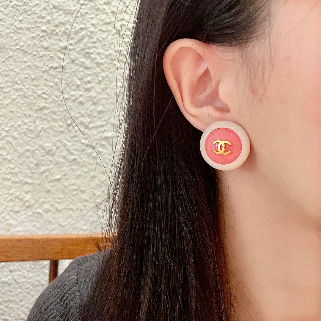 Double-C Emblem Stud Earrings in Polished Metal-Tone – Design 221 detail view