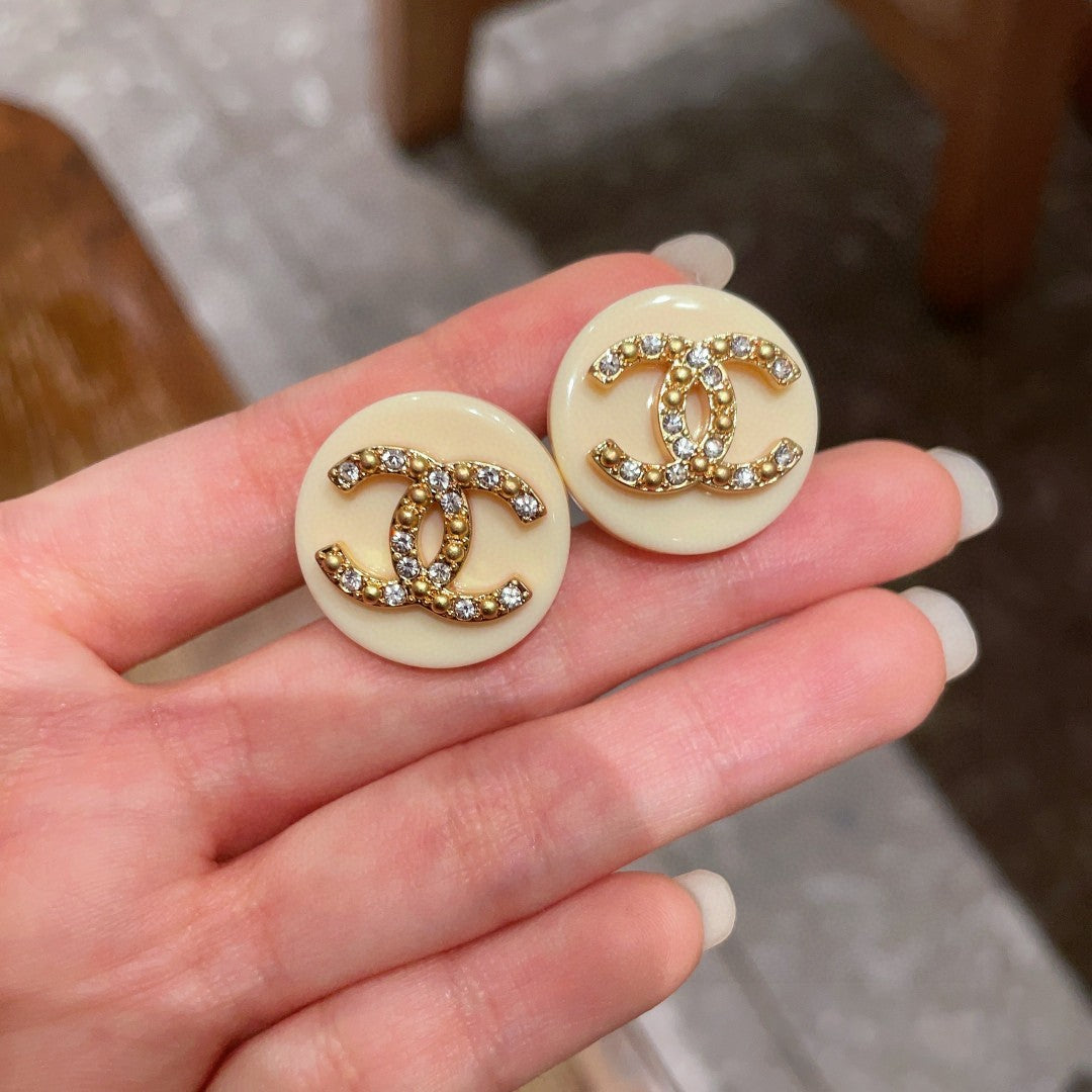 Double-C Emblem Stud Earrings in Polished Metal-Tone – Design 220 side detail