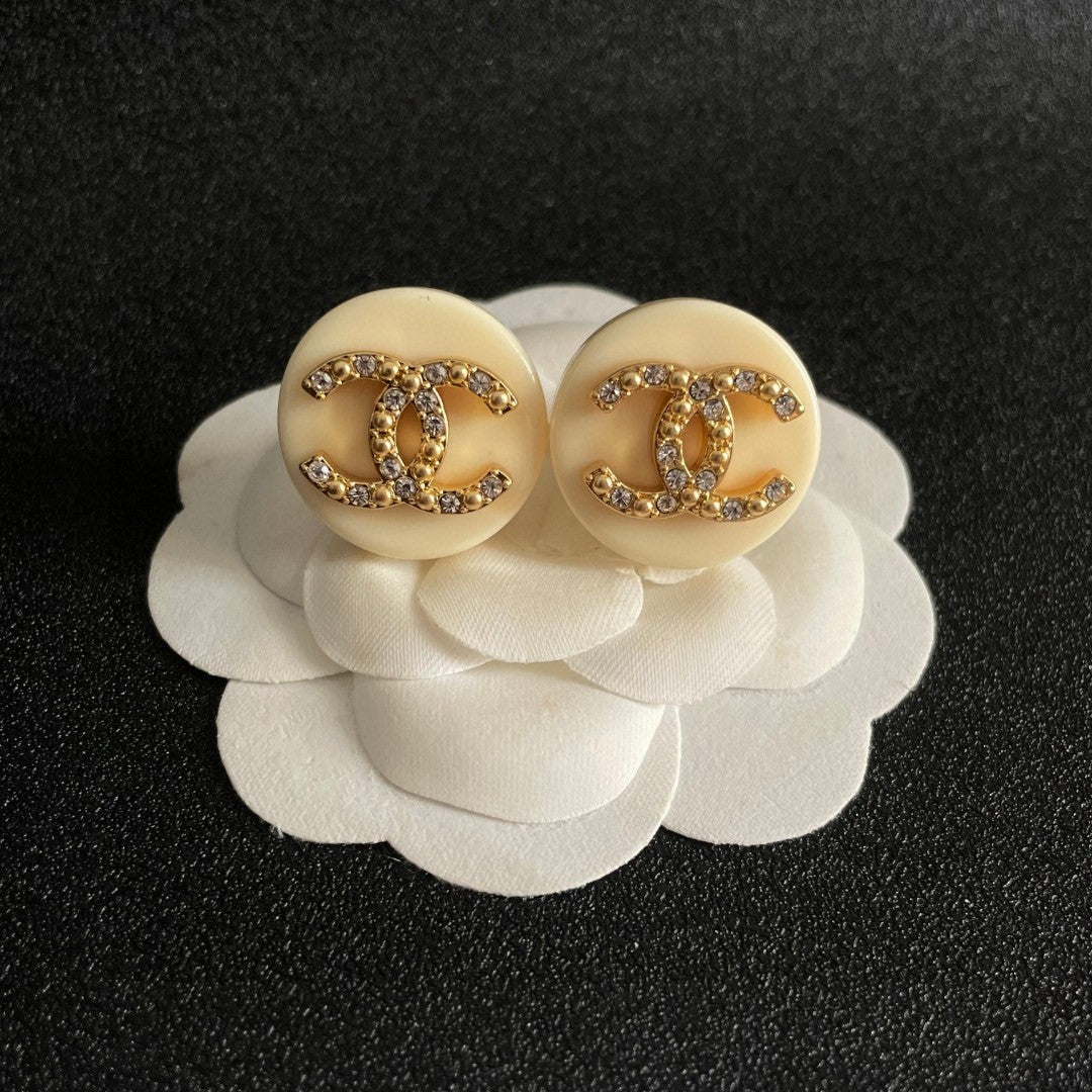Double-C Emblem Stud Earrings in Polished Metal-Tone – Design 220 front product view