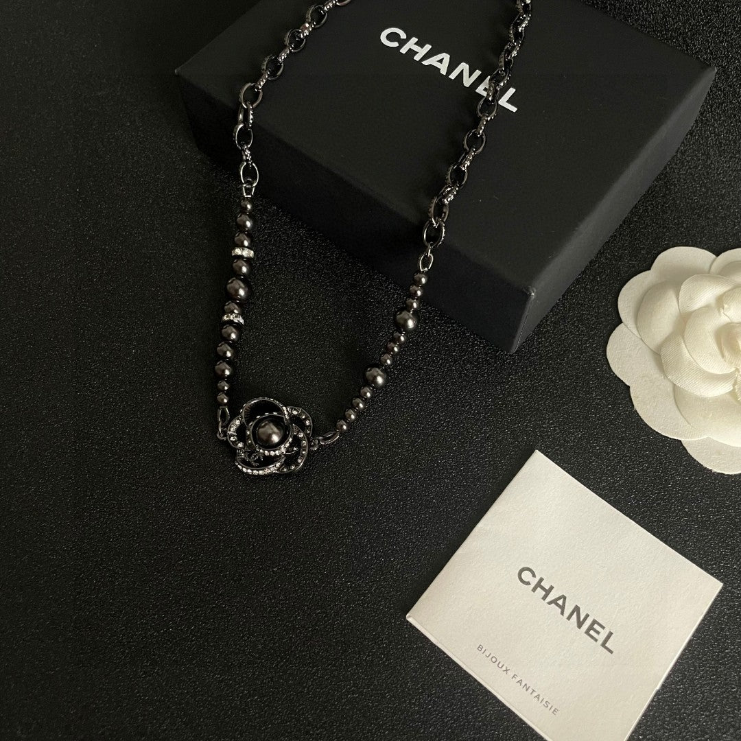 Camellia Pendant Necklace in Black-Tone close-up detail