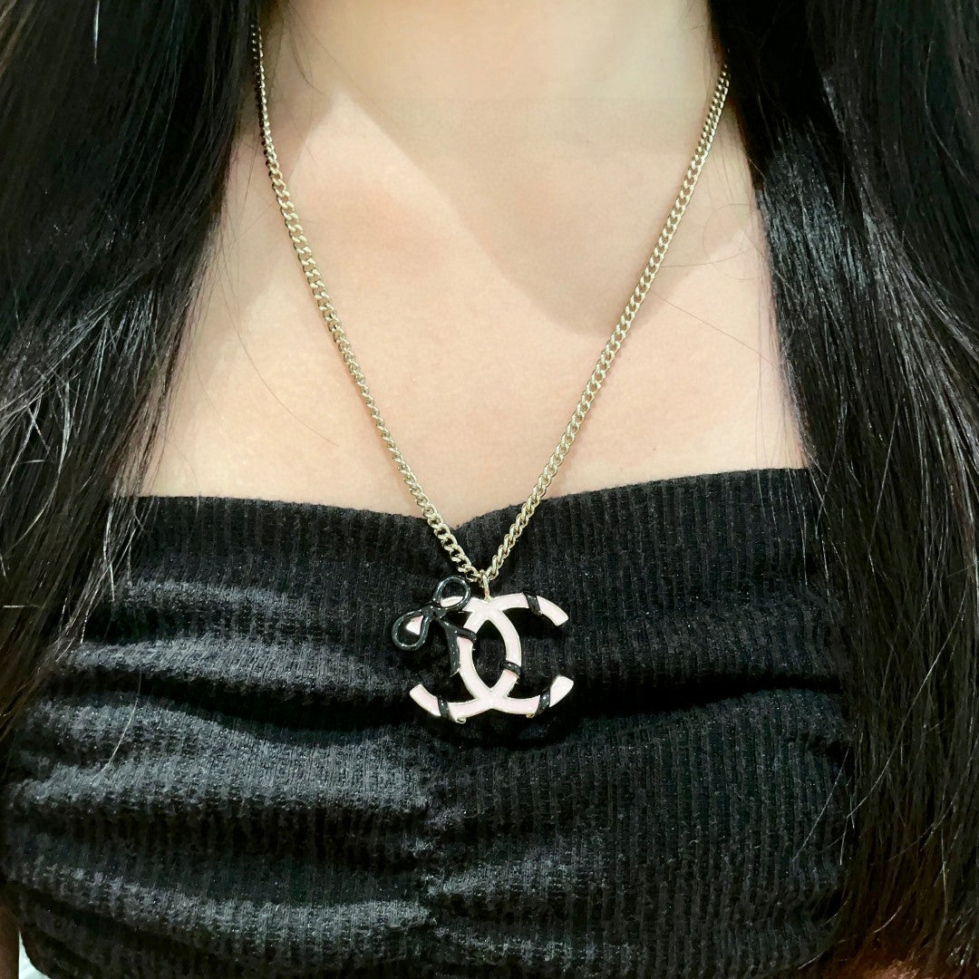 Double-C Emblem Pendant Necklace in Polished Metal-Tone – Design 026 detail view