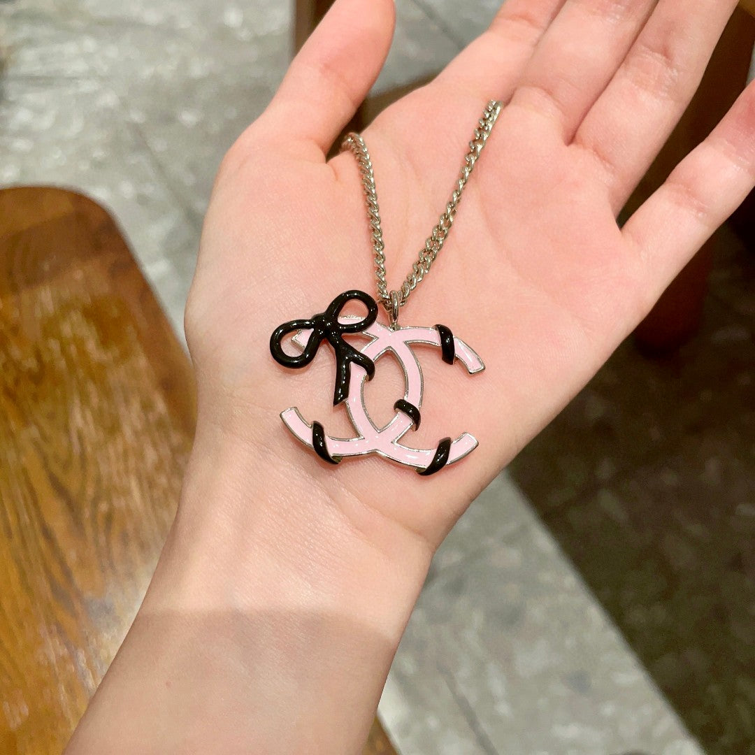 Double-C Emblem Pendant Necklace in Polished Metal-Tone – Design 026 side detail