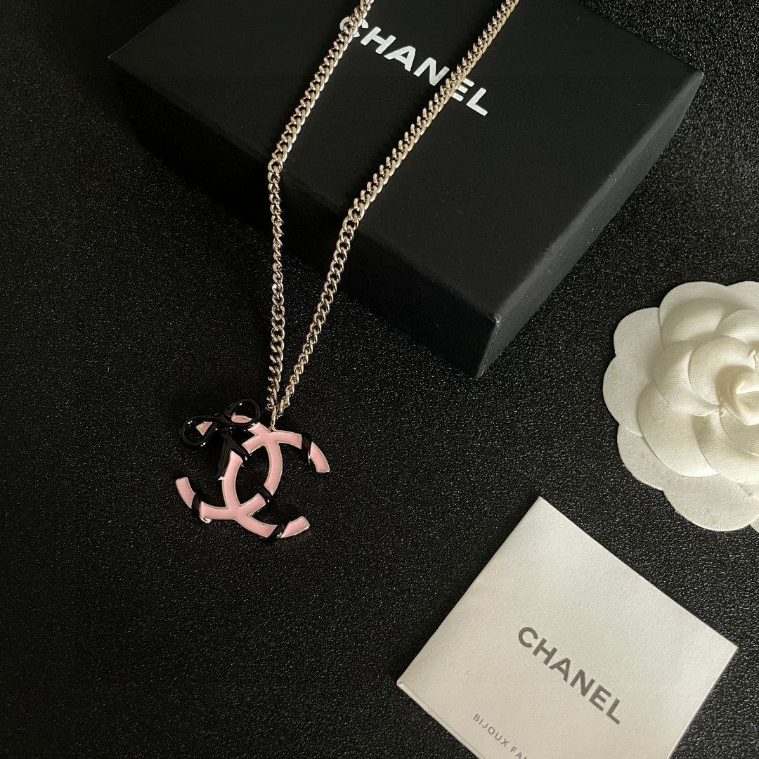 Double-C Emblem Pendant Necklace in Polished Metal-Tone – Design 026 close-up detail