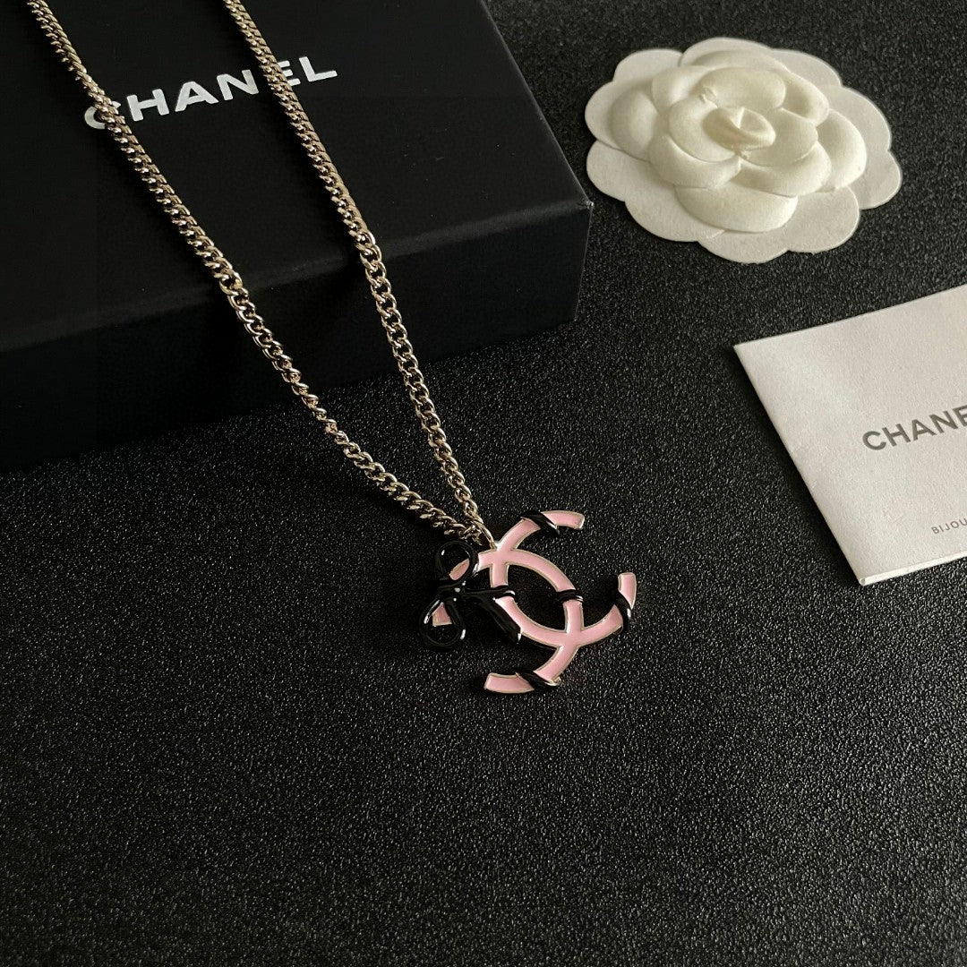 Double-C Emblem Pendant Necklace in Polished Metal-Tone – Design 026 styled product view