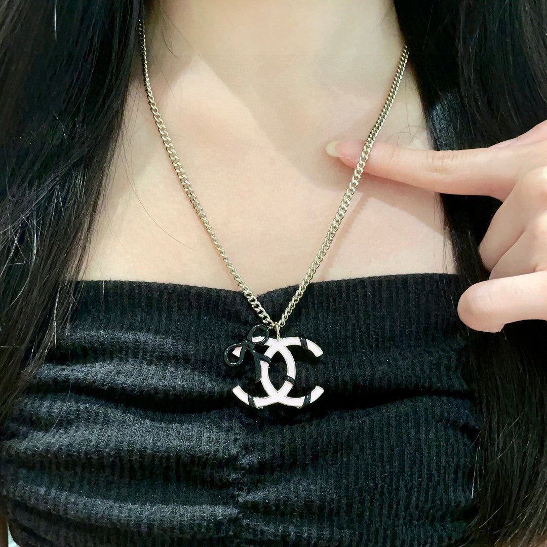 Double-C Emblem Pendant Necklace in Polished Metal-Tone – Design 026 front product view