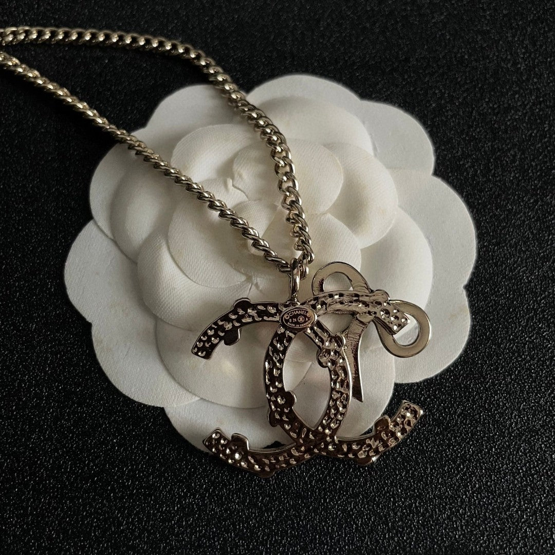 Double-C Emblem Pendant Necklace in Polished Metal-Tone – Design 026 front product view