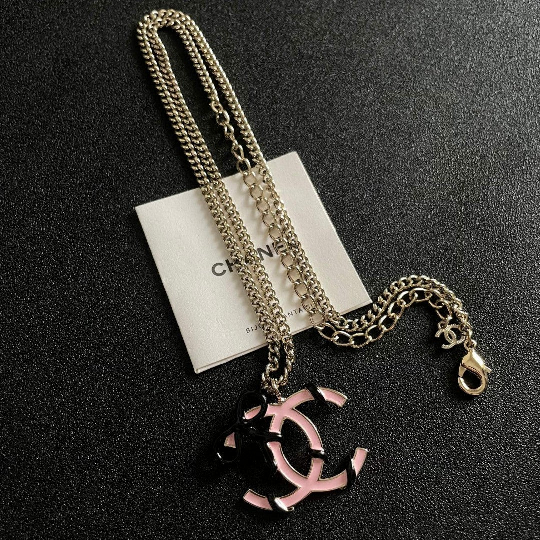 Double-C Emblem Pendant Necklace in Polished Metal-Tone – Design 026 detail view