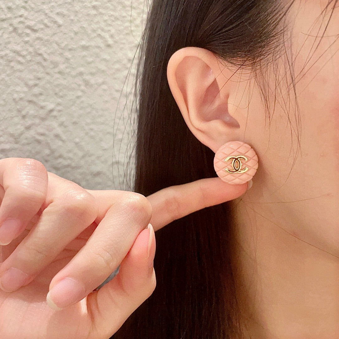 Double-C Emblem Stud Earrings in Polished Metal-Tone – Design 201 front product view