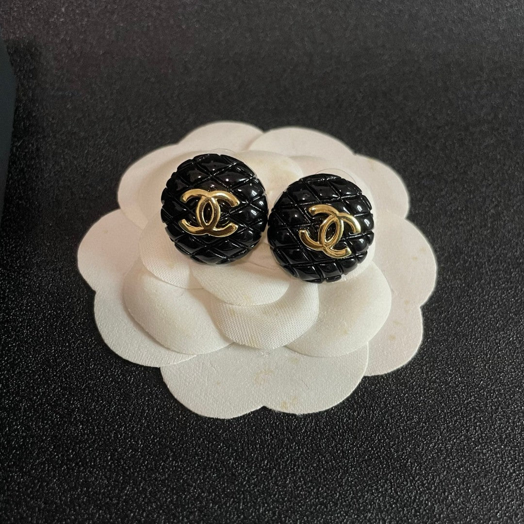 Double-C Emblem Stud Earrings in Polished Metal-Tone – Design 200 front product view