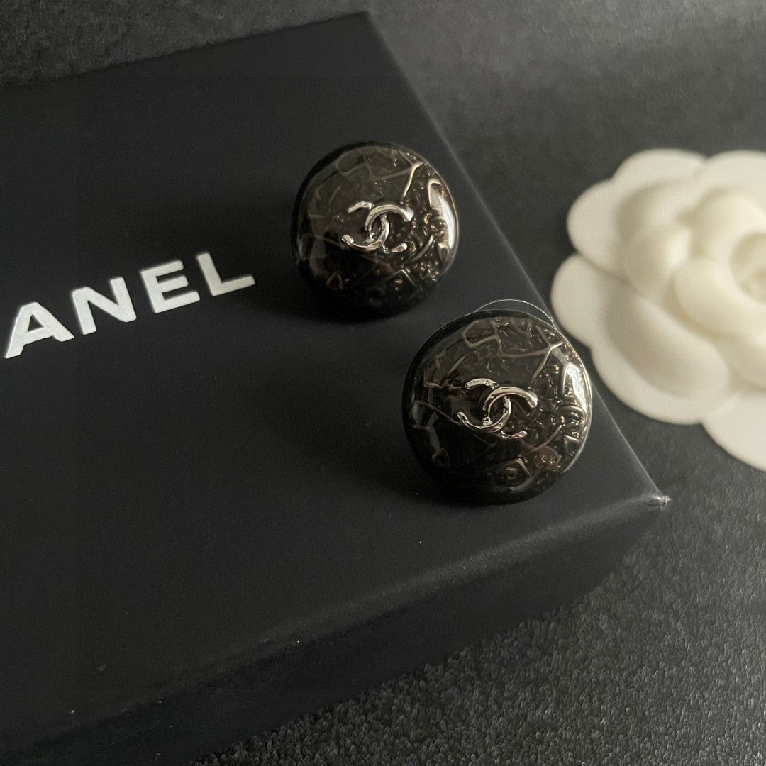 Double-C Emblem Stud Earrings in Polished Metal-Tone – Design 197 detail view