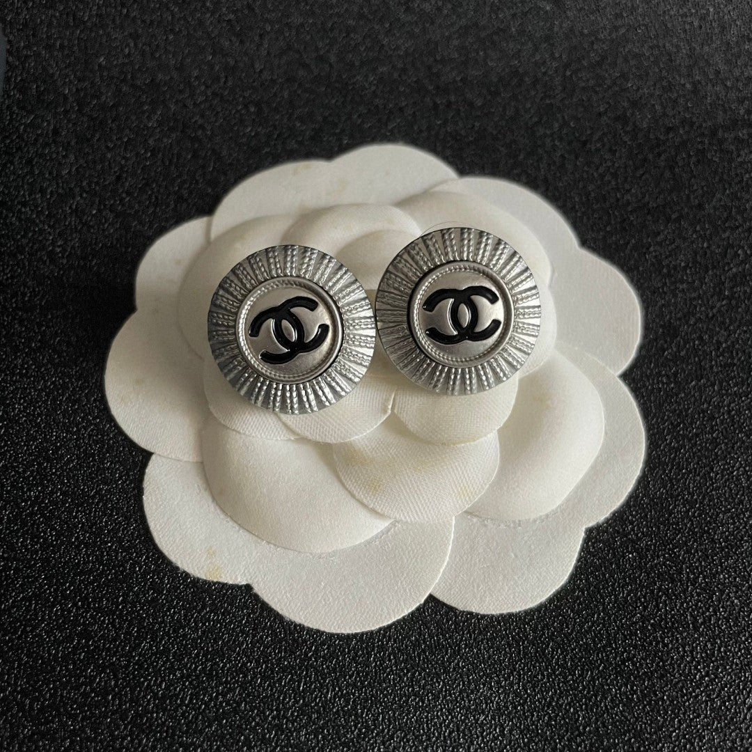 Double-C Emblem Stud Earrings in Polished Metal-Tone – Design 196 front product view