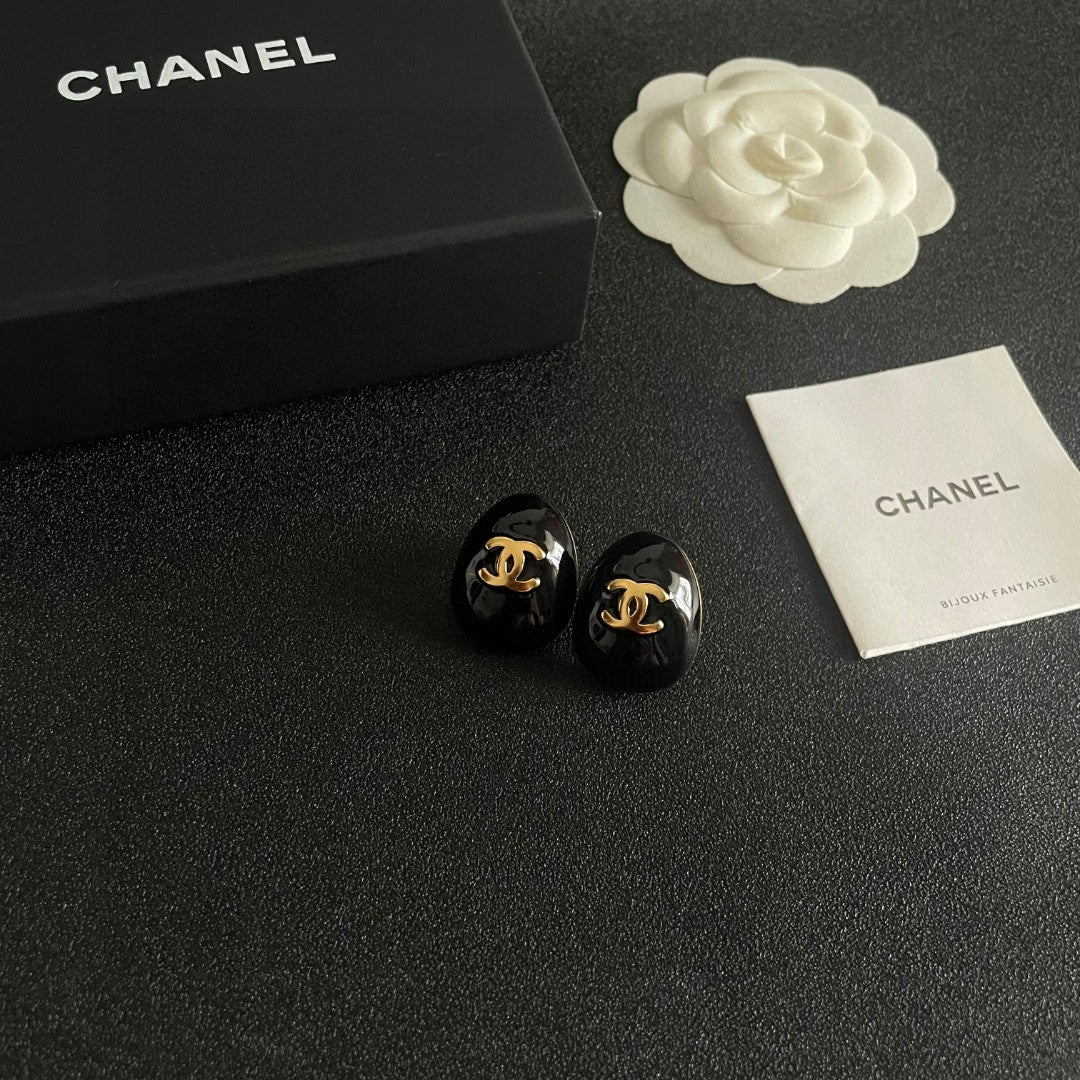 Double-C Emblem Stud Earrings in Polished Metal-Tone – Design 193 styled product view